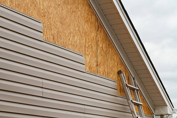 Professional Siding Contractor technician working in Fredericksburg, PA